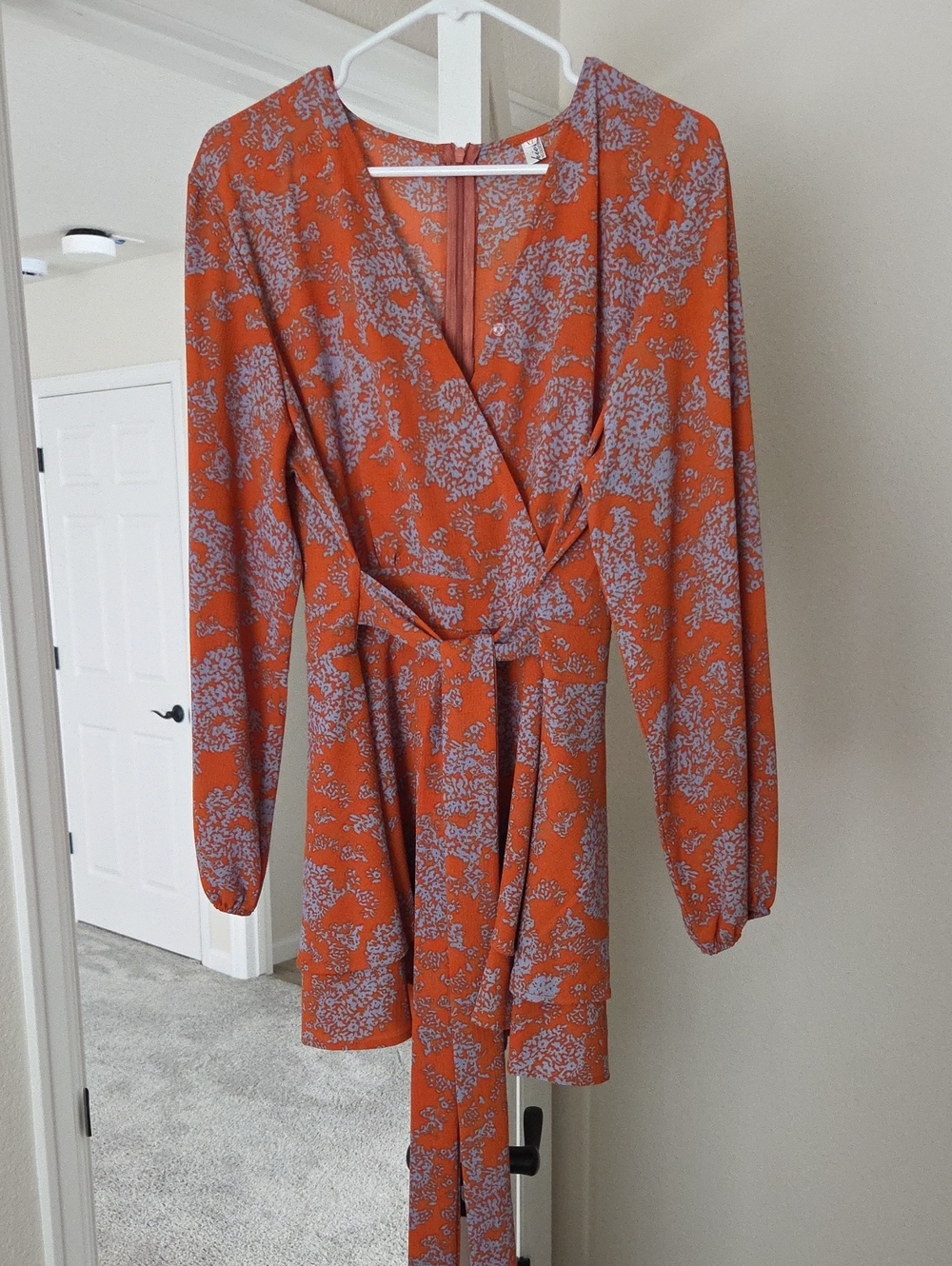 Women's Orange Floral Romper with Long Sleeves